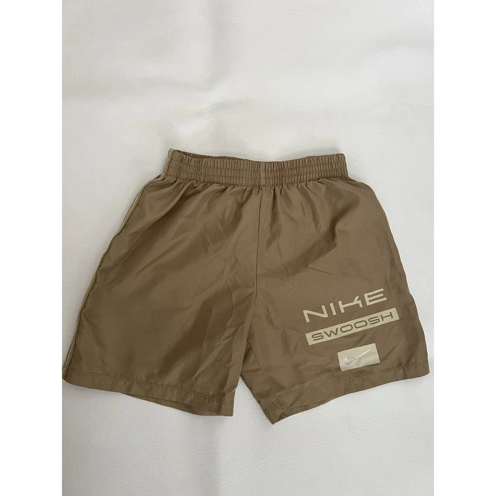 Nike Boys Size 6 Dri-FIT Parachute Khaki Swoosh Graphic Athletic Shorts Unlined